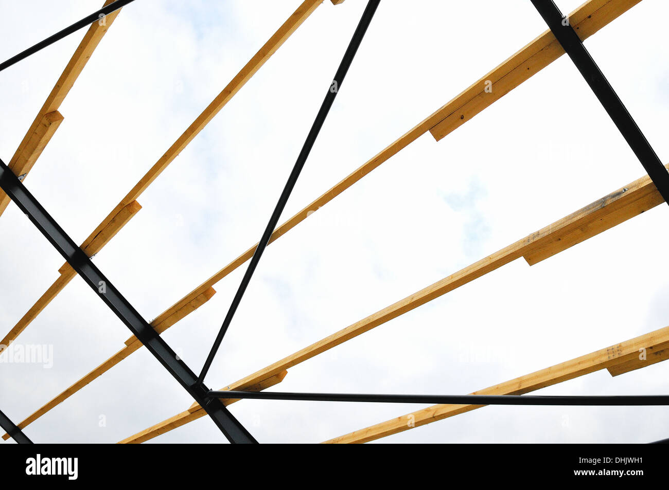 Steel and wooden roof construction Stock Photo