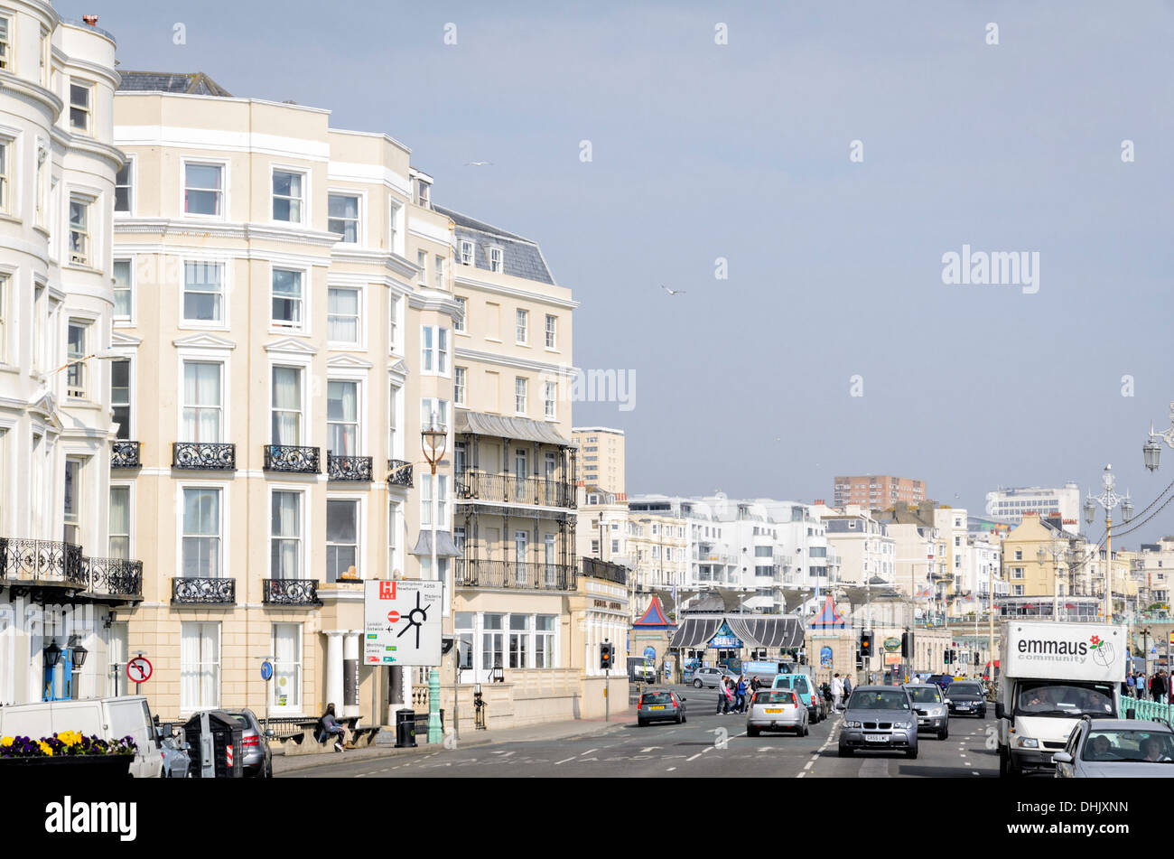 Light coloured Victorian-era hotels on the sea front; typical English seaside resort scene. Stock Photo
