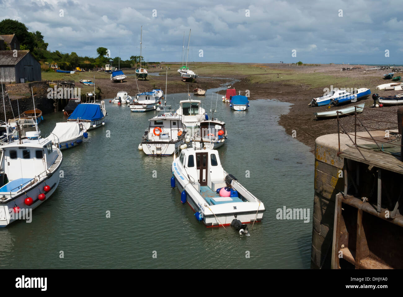 Harbour scene with motor boats anchored at Porlock Weir in Somerset Stock Photo