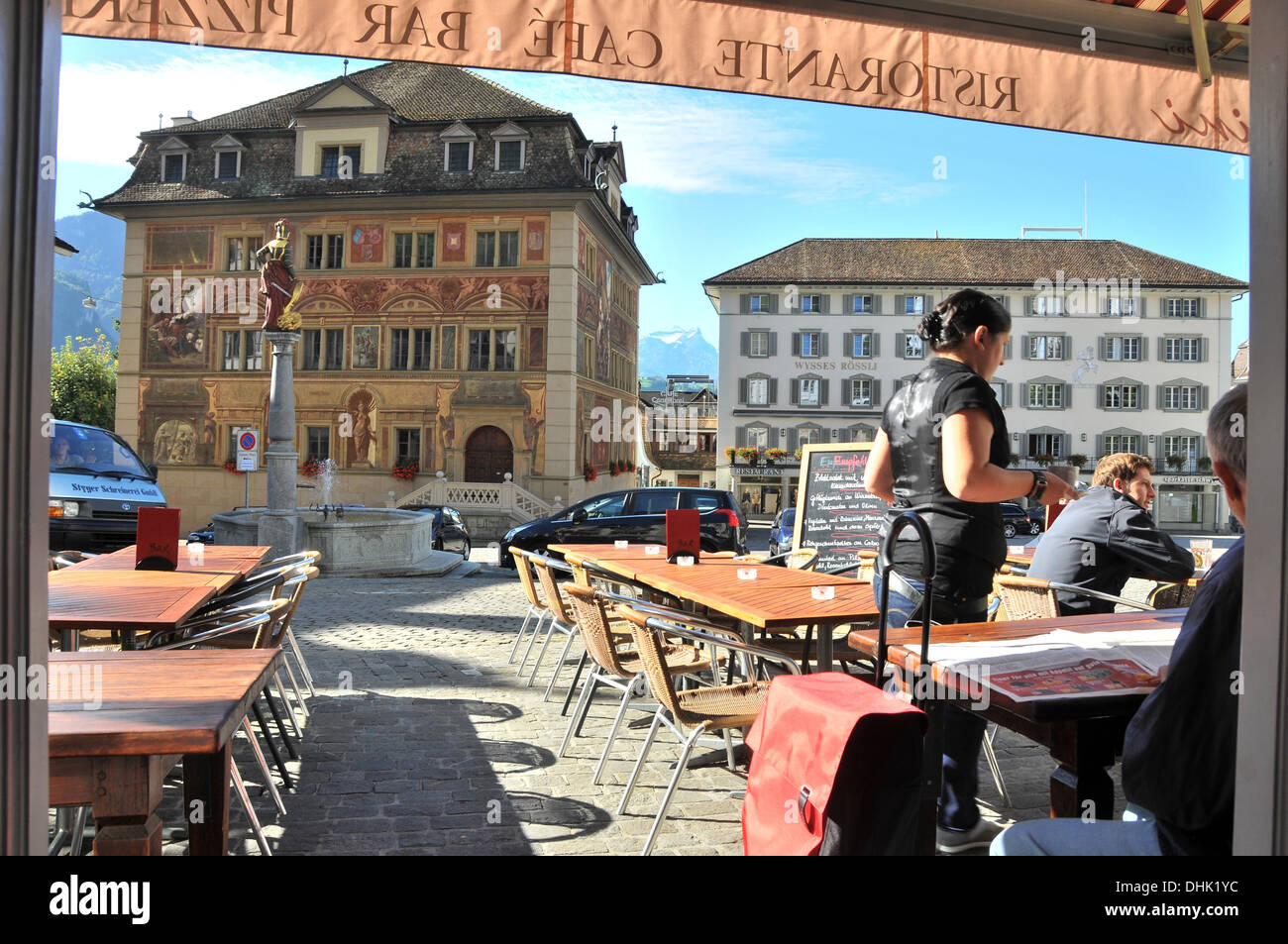 Cafe at the market place and townhall of Schwyz, Canton Schwyz, Centralswitzerland, Switzerland, Europe Stock Photo