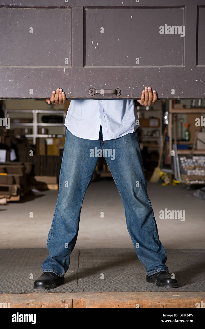 Opening warehouse door Stock Photo