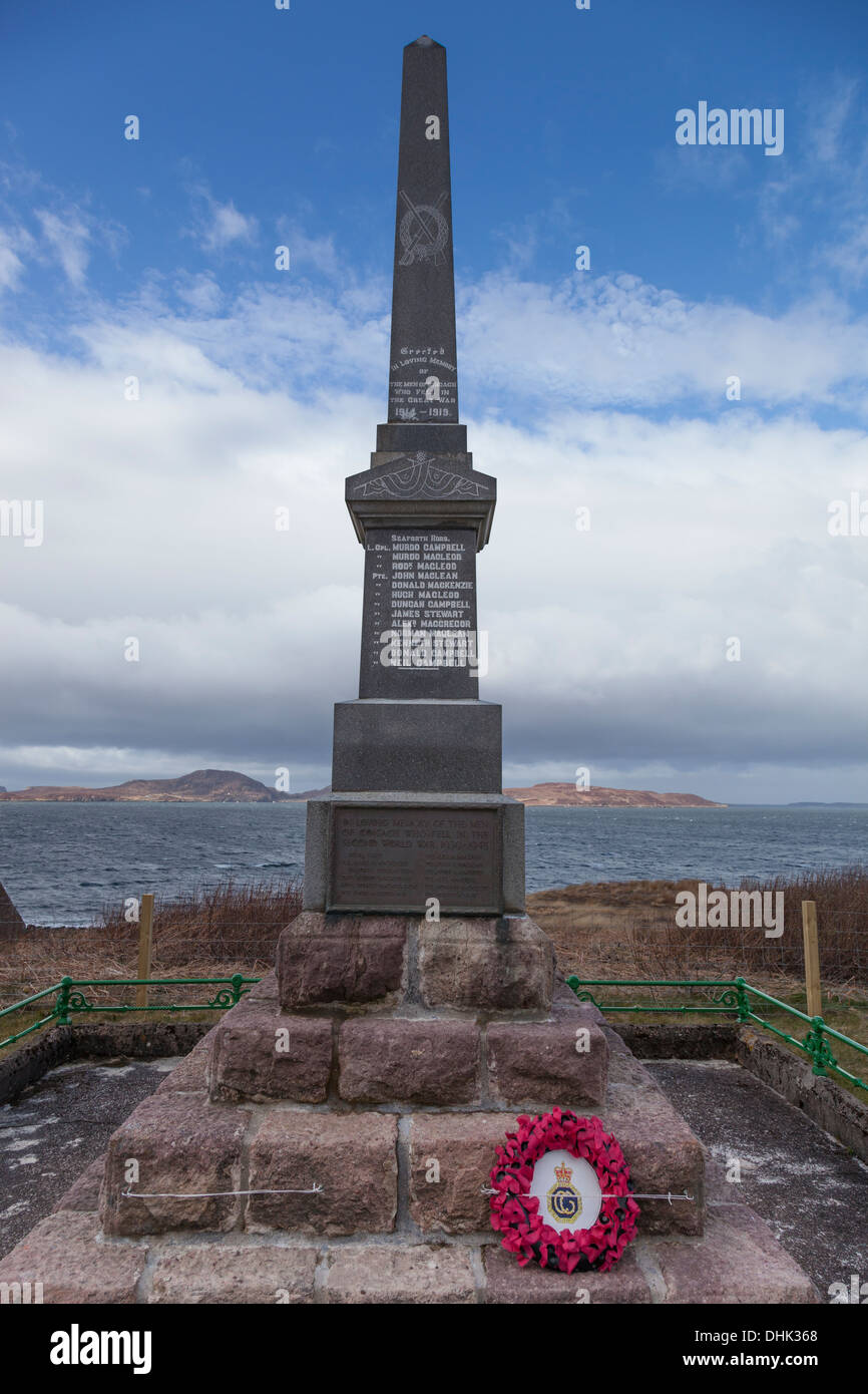 War memorial at Achiltibuie, Scotland. A tribute to the men of the Coigach peninsula with the Summer Isles in the background. Stock Photo