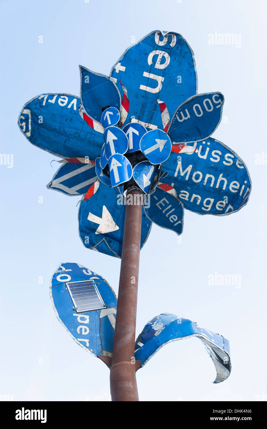 Germany, Munich, flower sculpture, old traffic signs during Tollwood Festifal Stock Photo