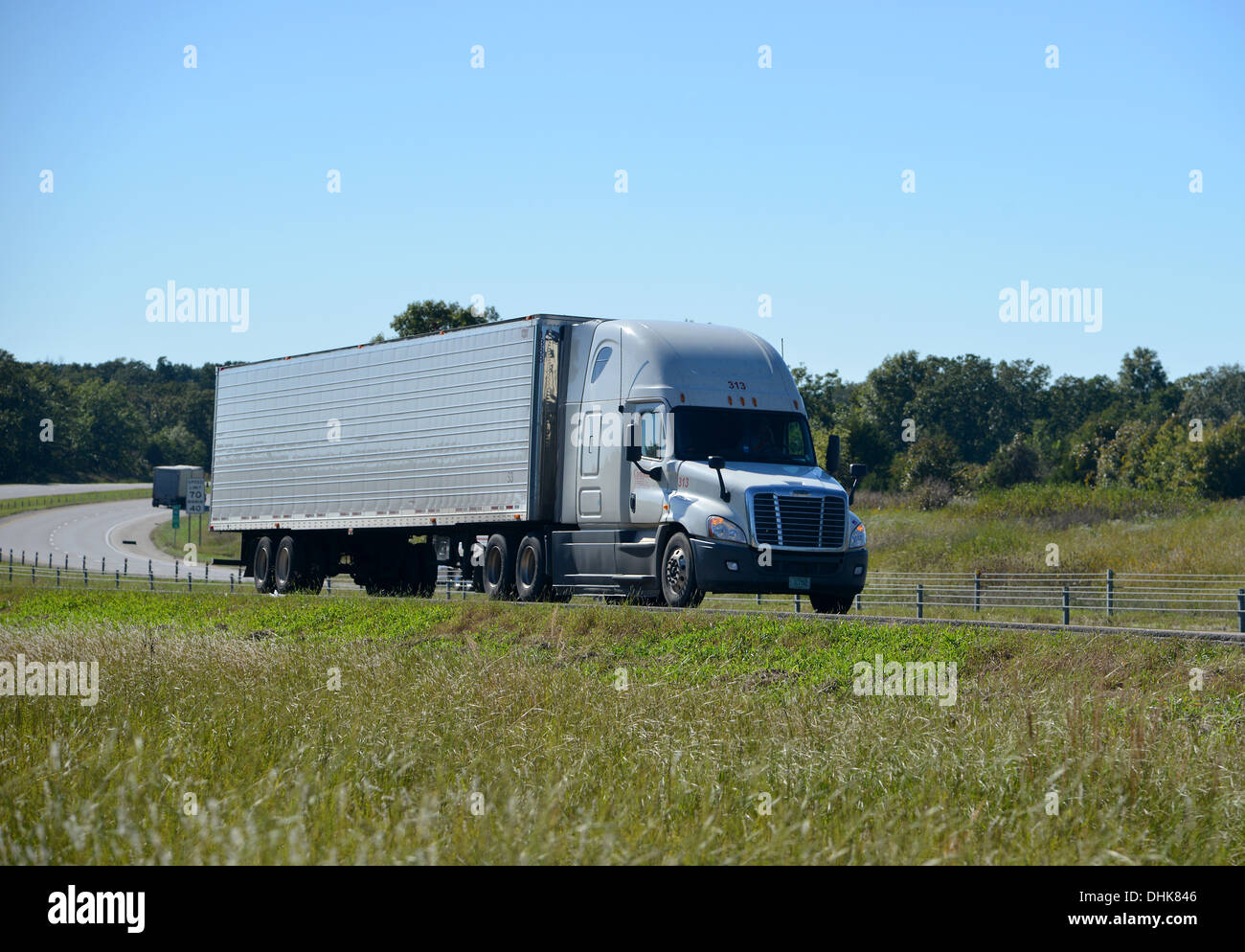Big Rig American Semi trailer articulated tanker truck speeds along Route 66 Stock Photo