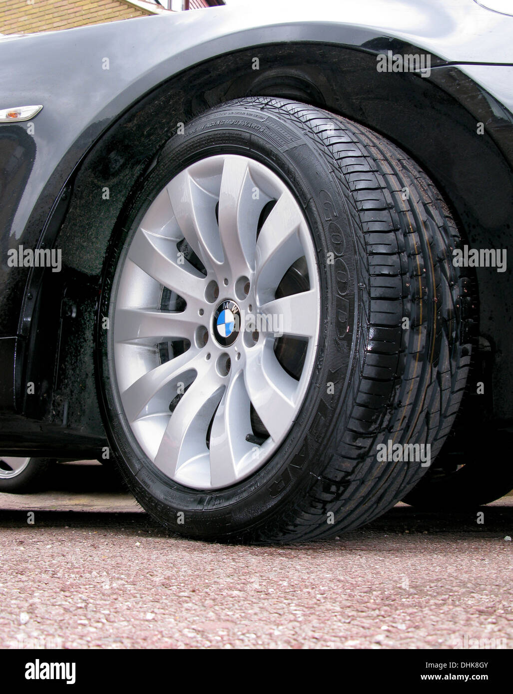 New tire on a BMW alloy wheel Stock Photo Alamy
