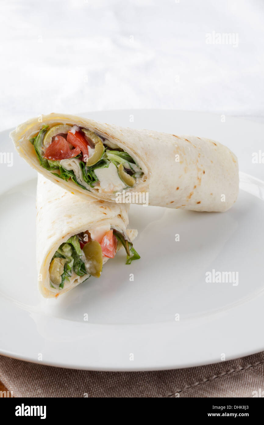 sandwich wrap filled with salad, feta and olives Stock Photo