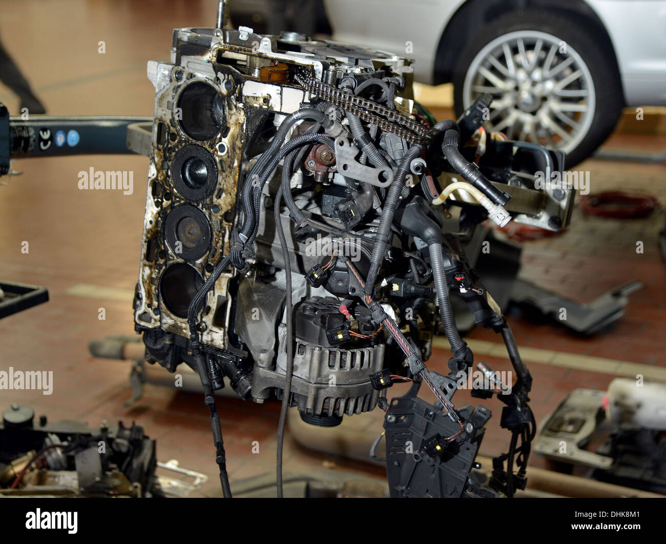 Stripped BMW N47 diesel engine in a garage workshop Stock Photo