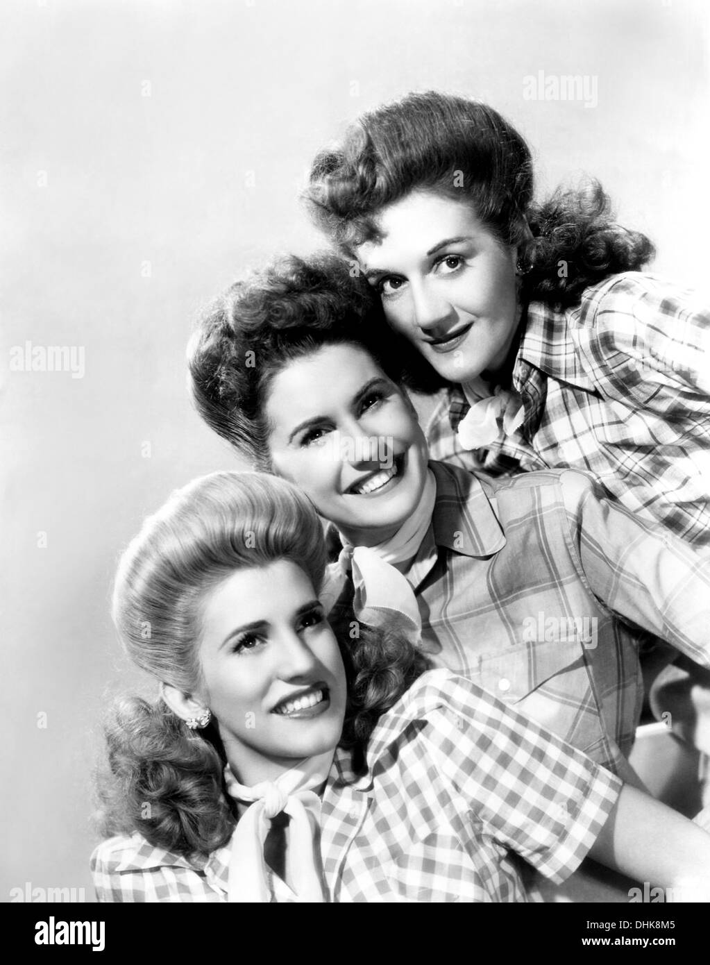 THE ANDREWS SISTERS US vocal group about 1943. From top: LaVerne, Patty and Maxene Stock Photo