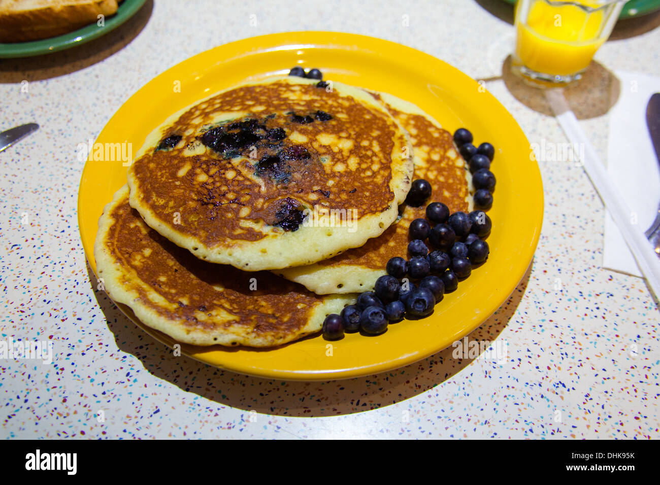 Blueberry breakfast pancake's, Tick tock diner at the New Yorker Hotel, Eighth Avenue, Manhattan, New York City, United States o Stock Photo