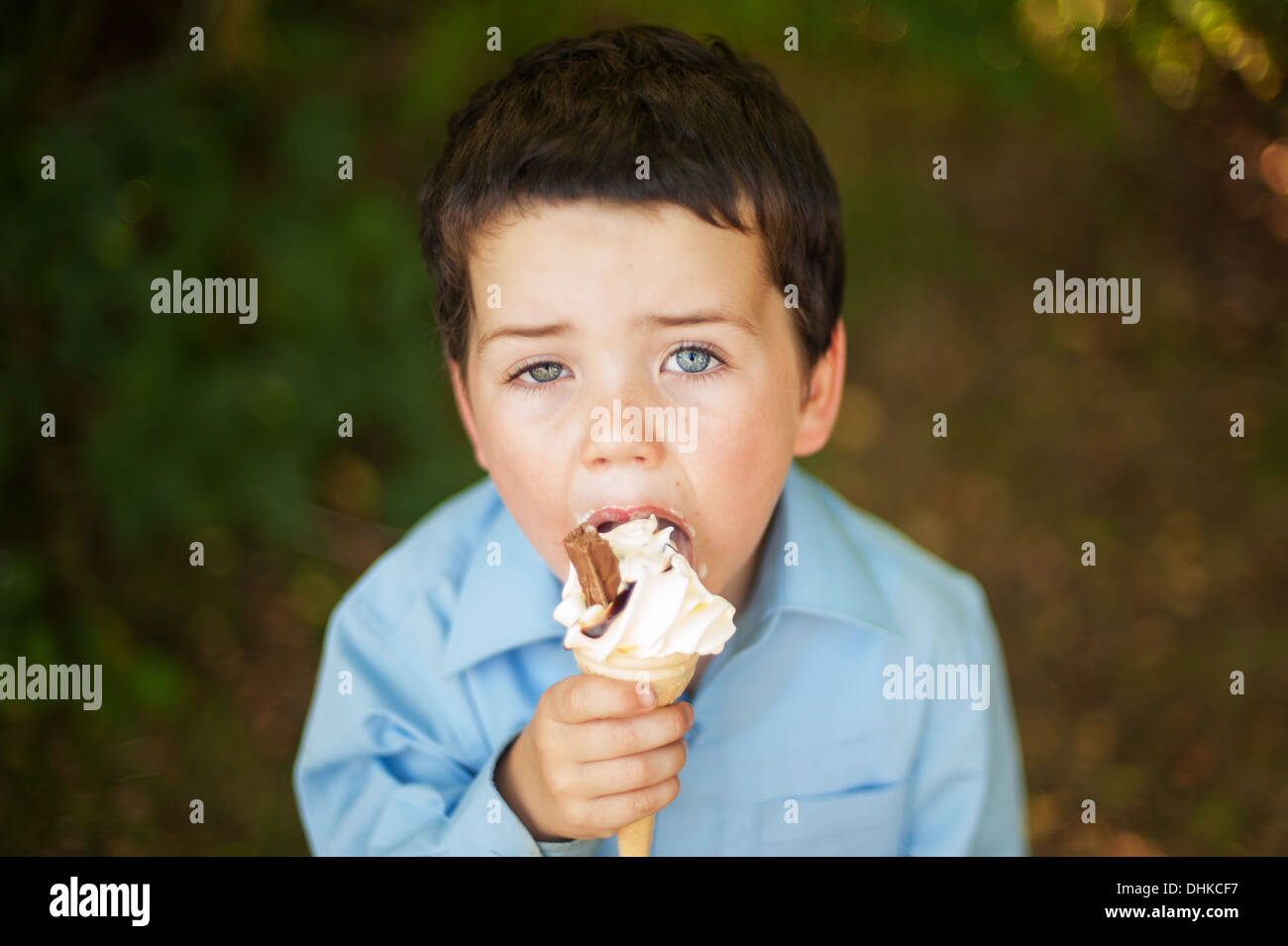 School Boy Eating Ice Cream Stock Photo