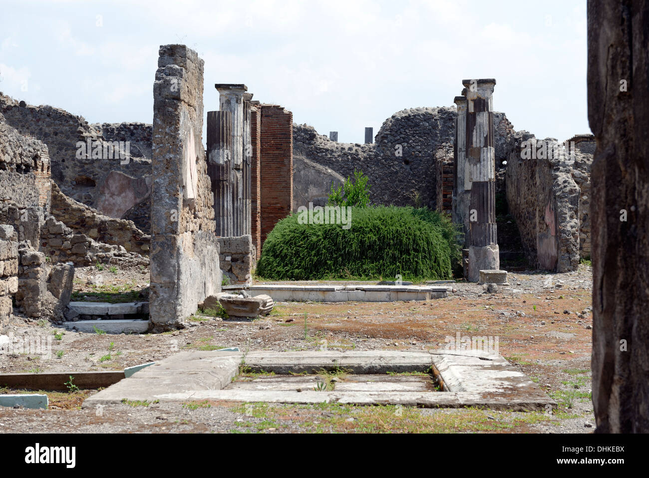 Looking across the impluvium in atrium, tablinum and peristyle of the House of Centauro, Pompeii Italy. Stock Photo