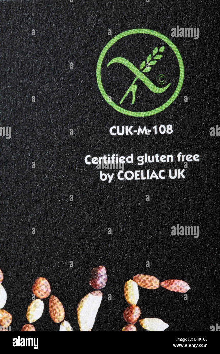 Certified gluten free by Coeliac UK on packet of Eat Natural peanuts almonds and hazelnuts Stock