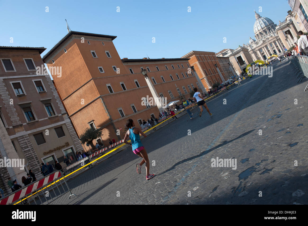 Girl in race in Vatican city Stock Photo