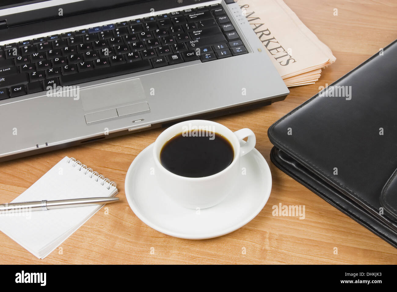 Cup from coffee on the laptop Stock Photo