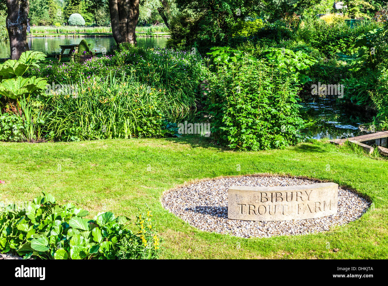 The pretty landscaped garden of the Trout Farm in the Cotswold village