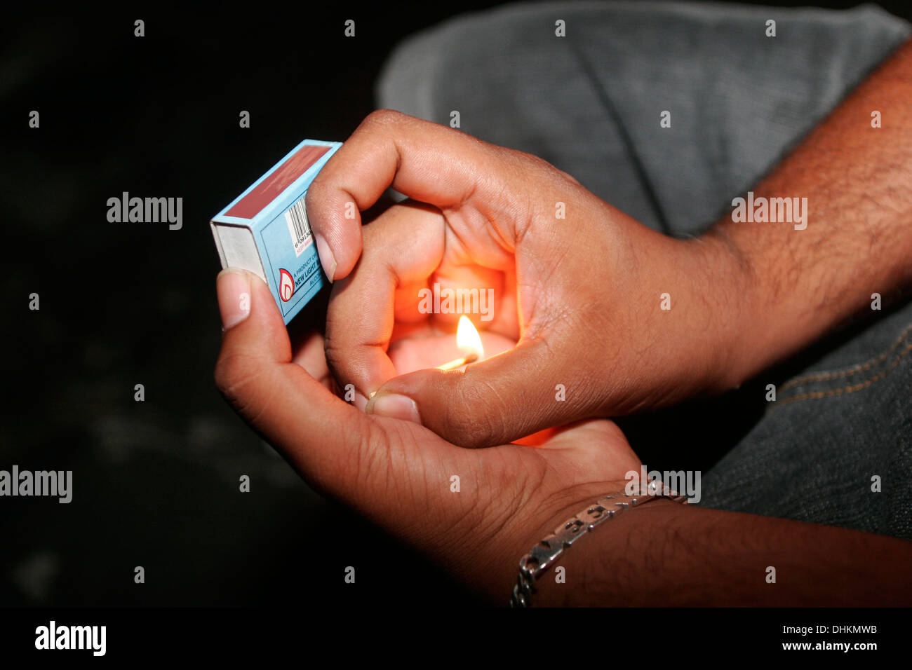 Lighting match hi-res stock - Alamy