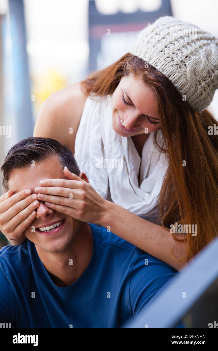 Young Couple teasing each other in the city Stock Photo