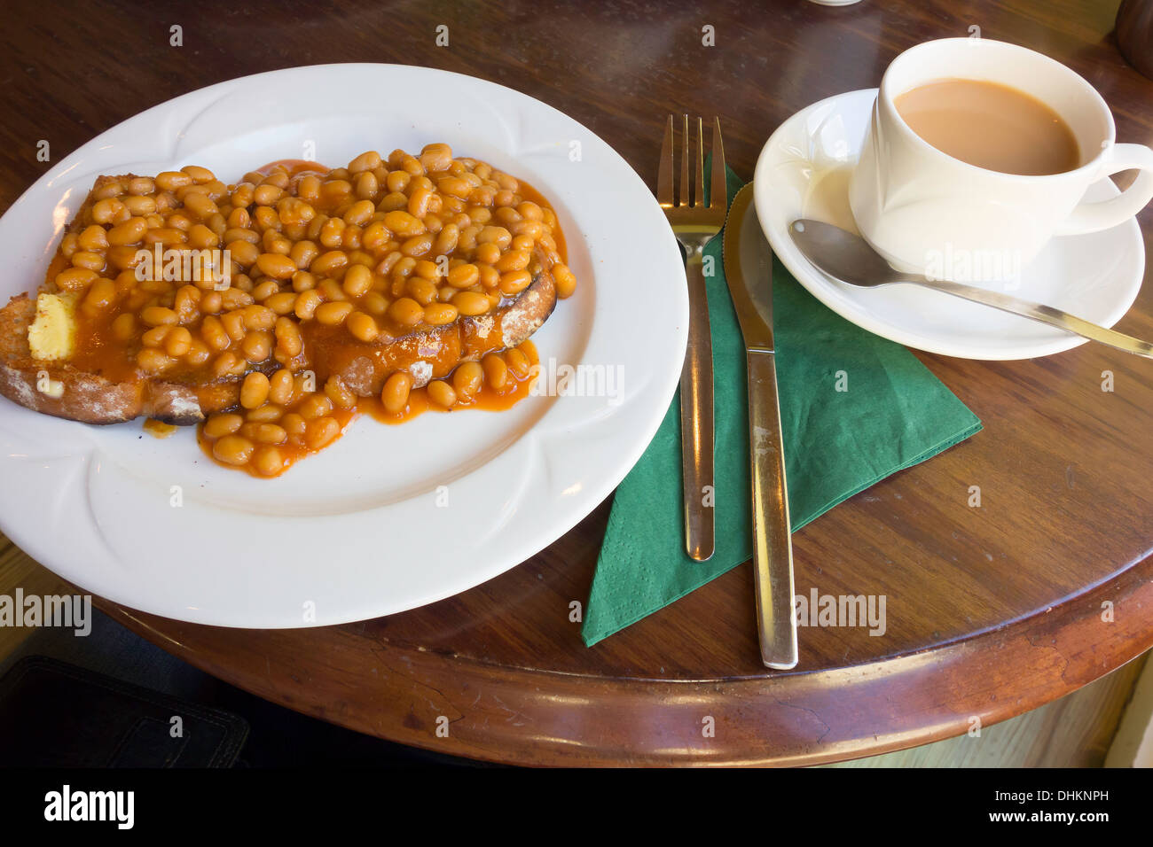 Cheap wholesome lunch baked beans on buttered toast and tea Stock Photo