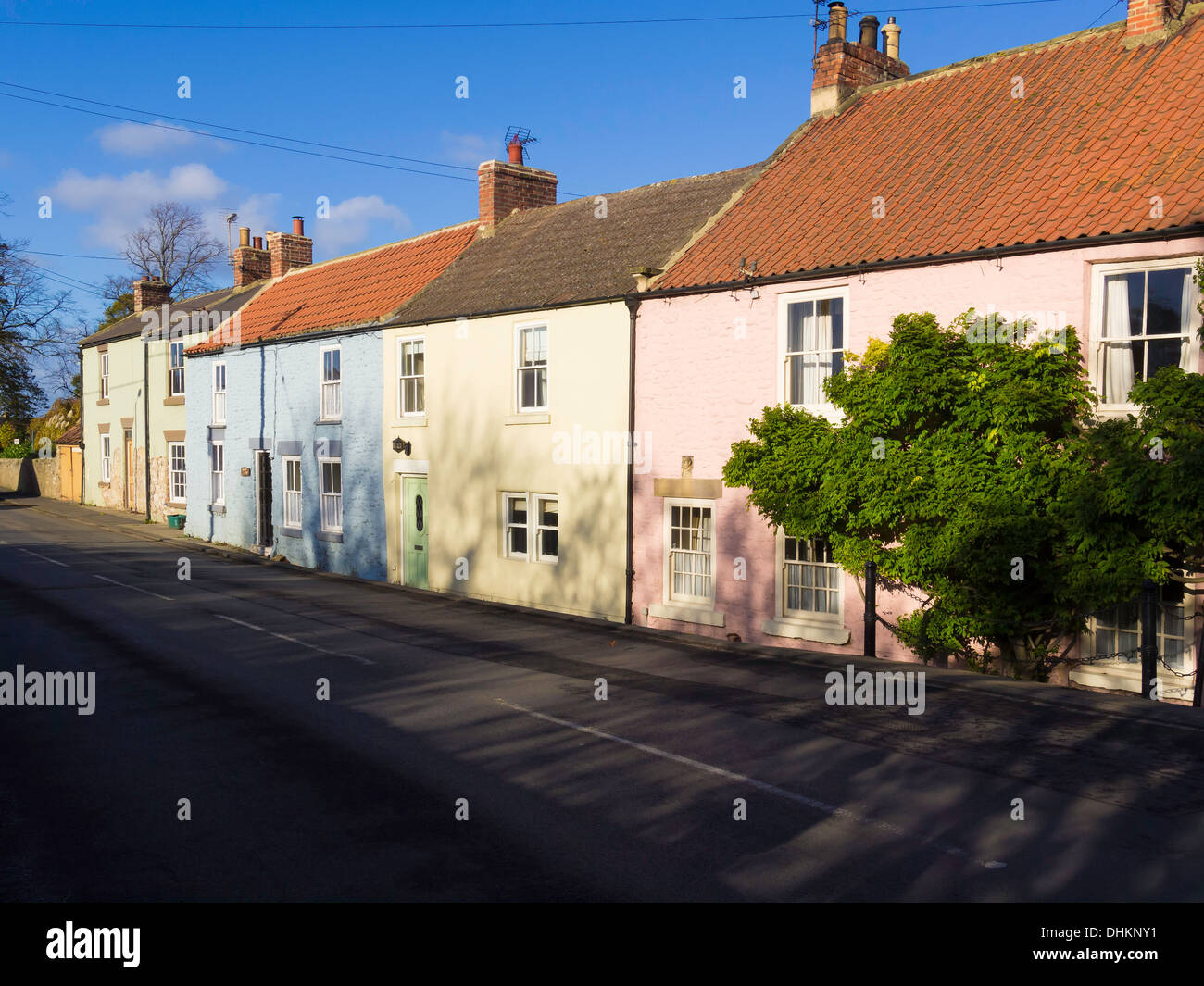 A row of cottages by the river Tees at Piercebridge Co. Durham in autumn Stock Photo