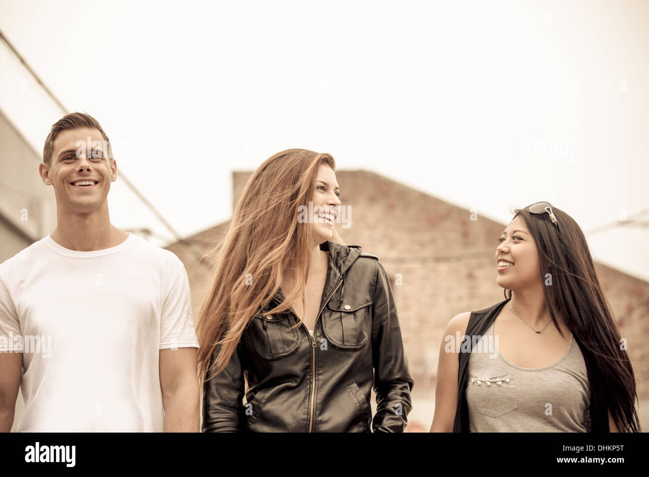 Group of young people walking hi-res stock photography and images - Alamy
