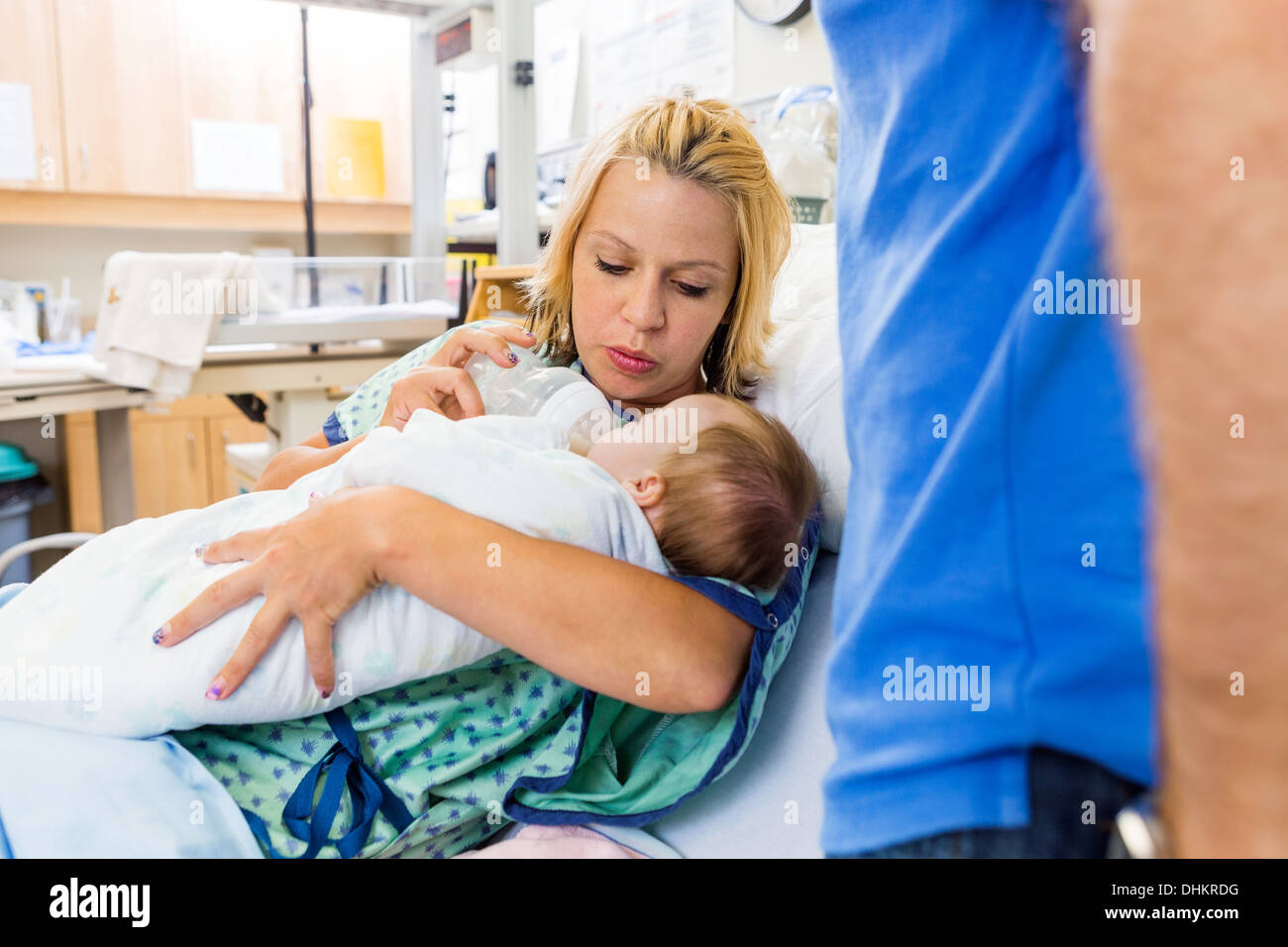 Woman Feeding Milk To Newborn Baby On Hospital Bed Stock Photo Alamy