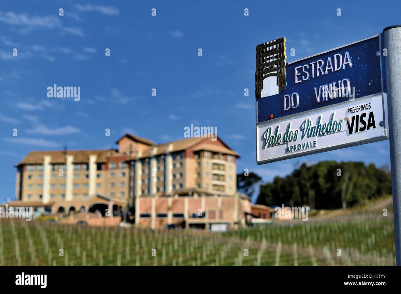 Brazil, Bento Gonçalves: Street signal indicating 'Vine Street'  and 'Vineyard´s Valley' with Hotel & Spa do Vinho in the back Stock Photo