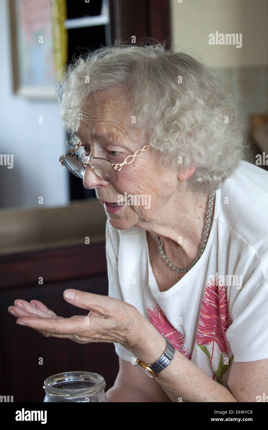 Conversational Polish great grandmother age 88 gestures as she speaks. Zawady Central Poland Stock Photo