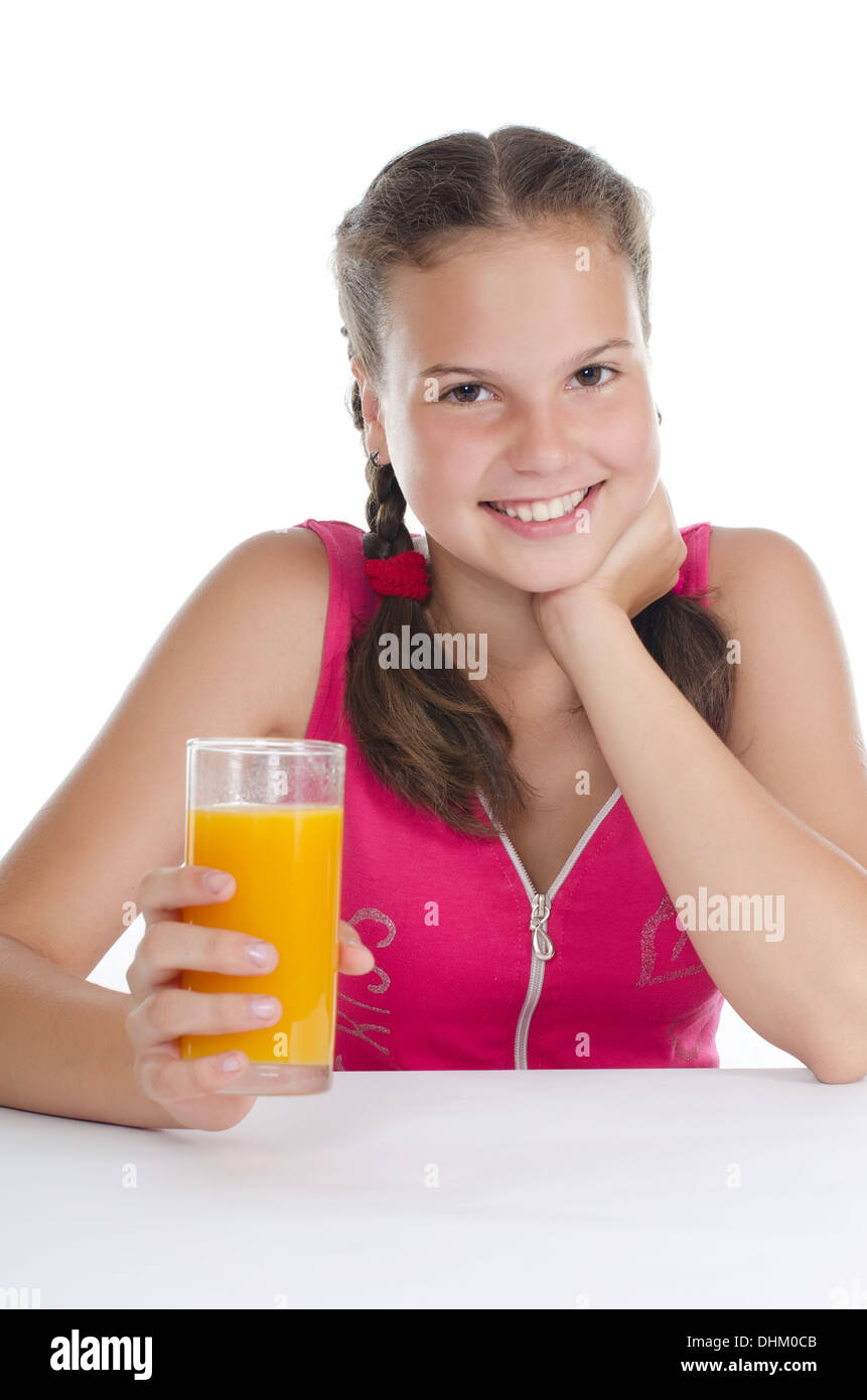 Young girl with a juice glass Stock Photo Alamy