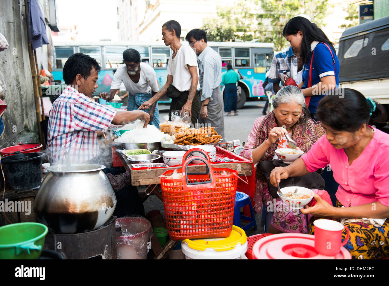 Street vendors selling snacks and street food in Yangon Stock Photo - Alamy
