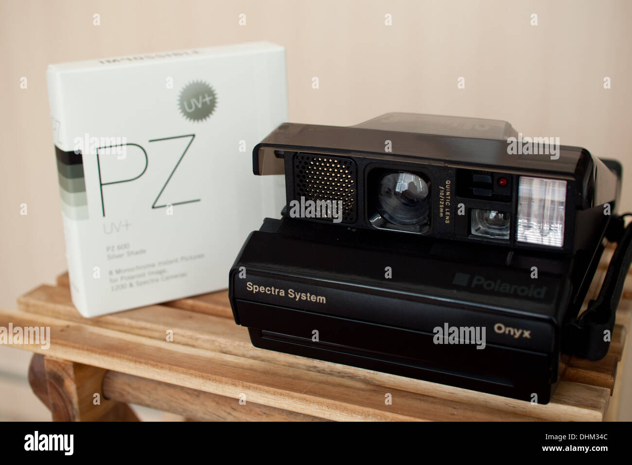 A Polaroid Spectra Onyx camera and Impossible PZ 600 Silver Shade film  Stock Photo - Alamy