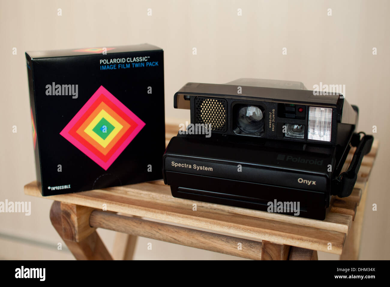 A Polaroid Spectra Onyx camera and Polaroid Image Softtone film (Polaroid  Classic packaging by Impossible Project shown Stock Photo - Alamy