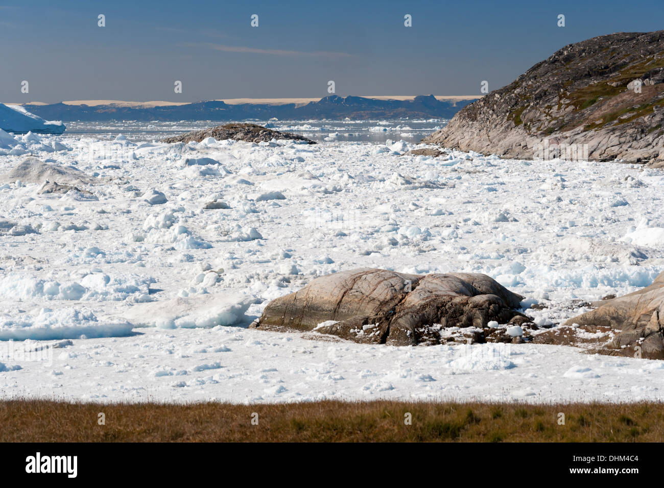 Greenland. The biggest glacier on a Jakobshavn. Huge icebergs of