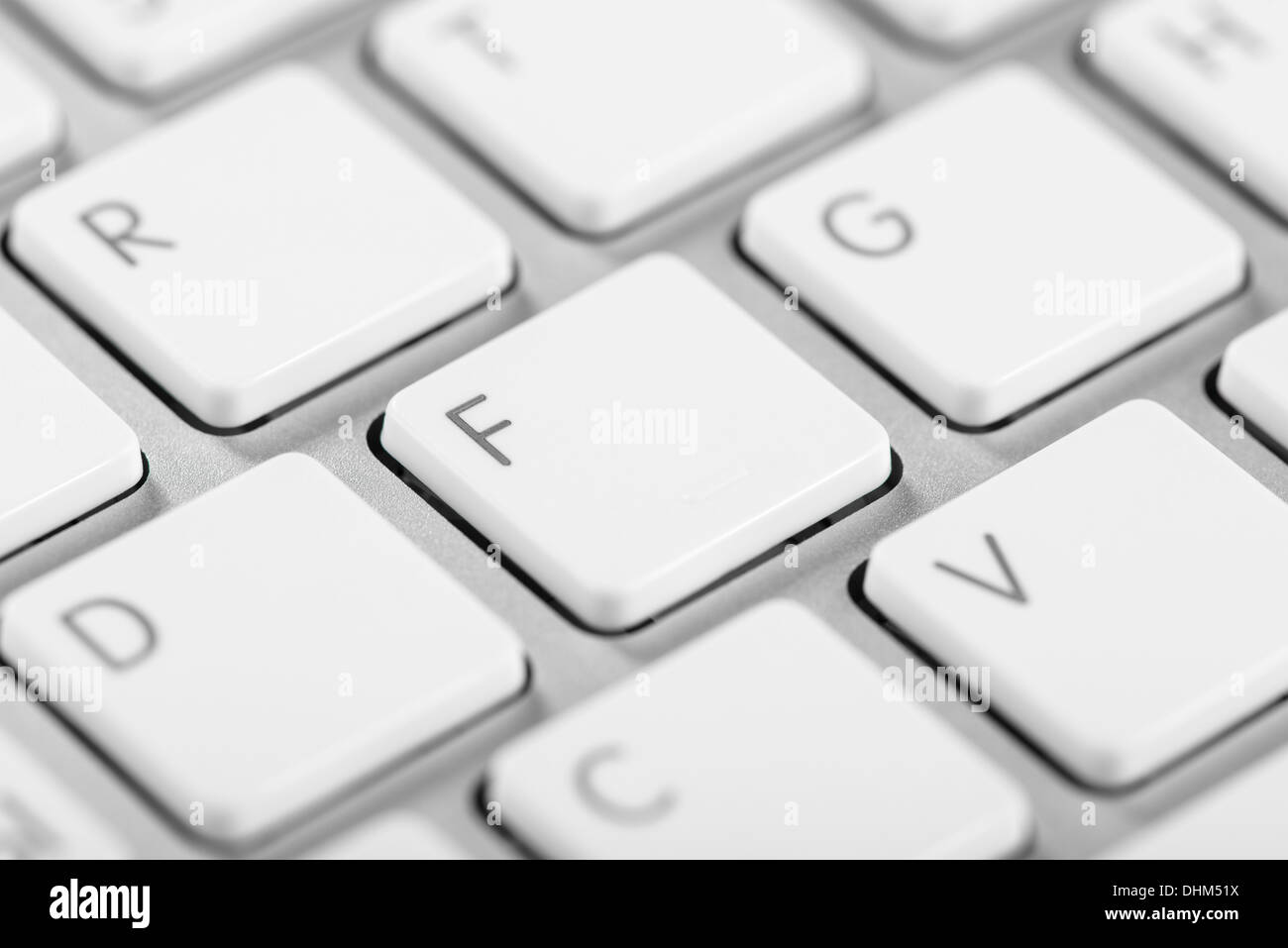 Macro shot of a computer keyboard keys with bokeh effect Stock Photo