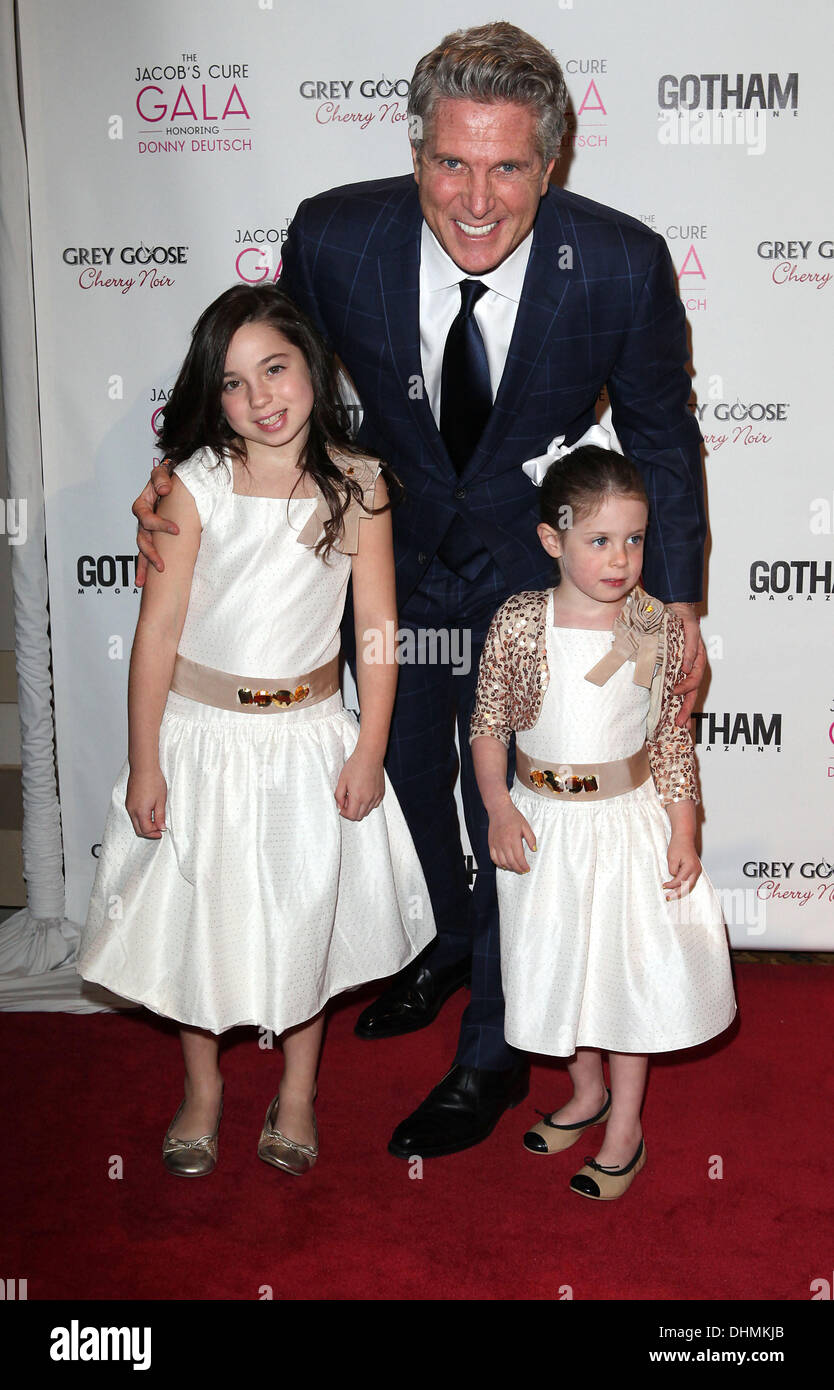 Donny Deutsch, and his two daughters,  at the Dream Big! The Jacob's Cure 2012 gala at Cipriani Wall Street. New York City, USA - 02.05.12 Stock Photo