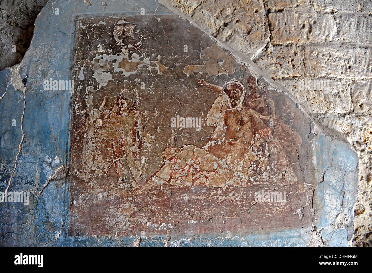 Damaged wall fresco inside a villa in Herculaneum Stock Photo