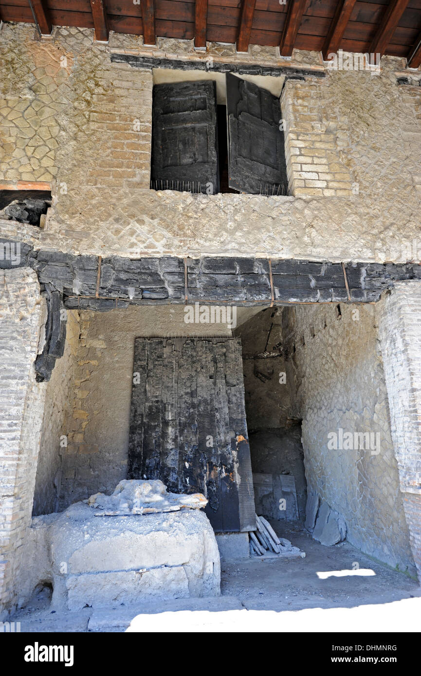 Remains of wooden doors, beams and in Herculaneum carbonized by the eruption Stock Photo