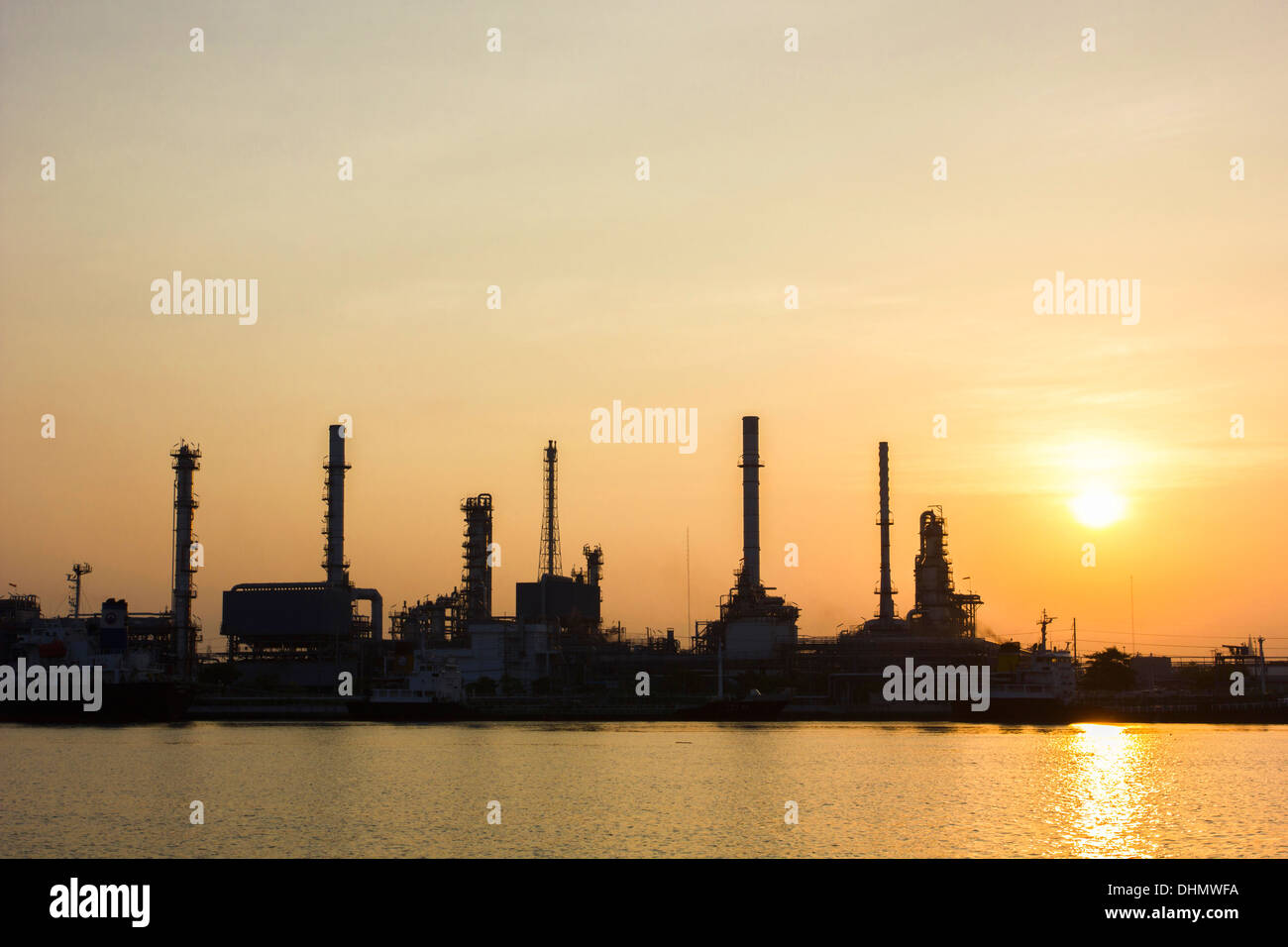 Oil refinery view with Sunrise Stock Photo