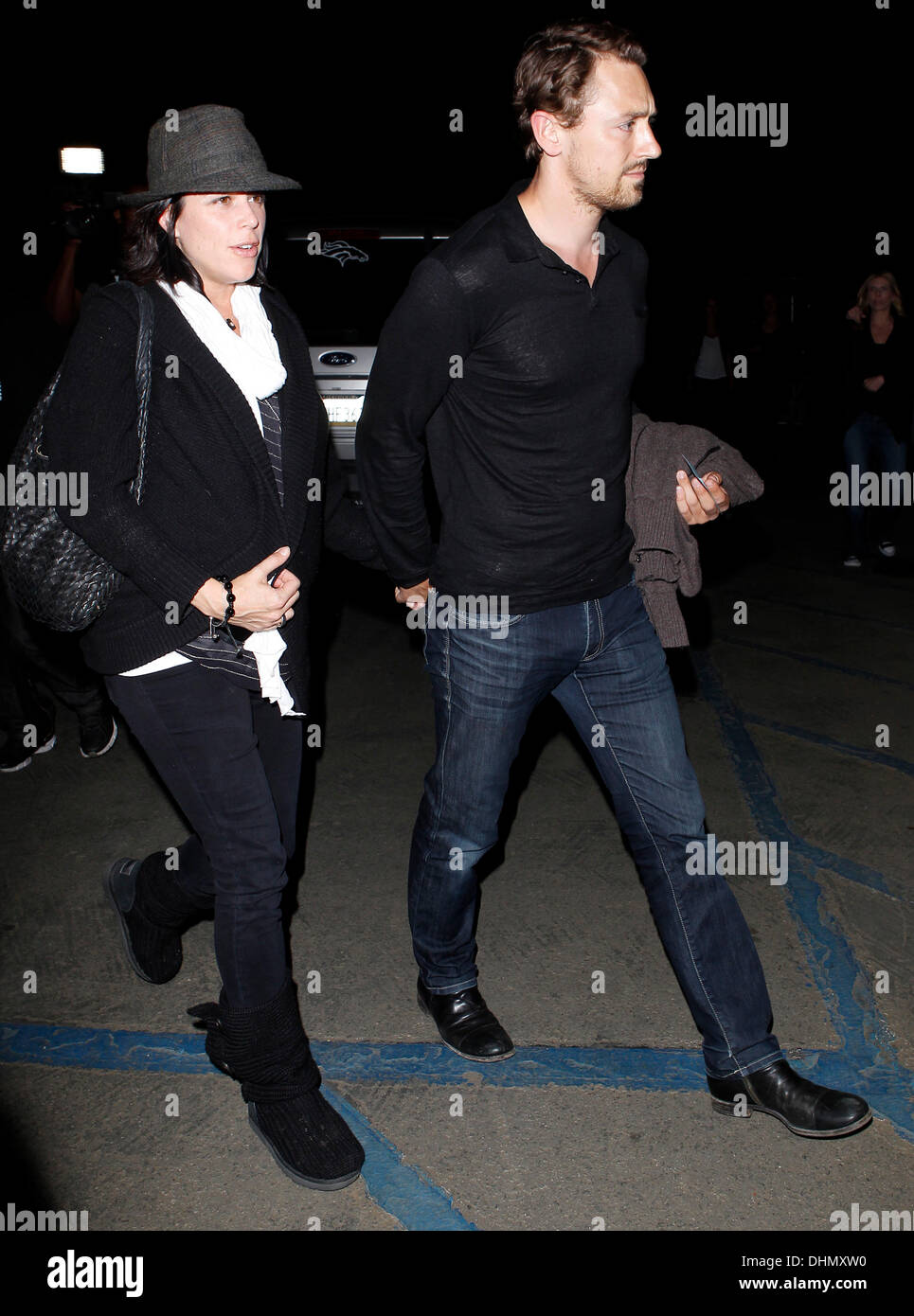 Neve Campbell and J.J. Field Celebrities arrive at The Hollywood Bowl to  watch Coldplay in concert Los Angeles, California - 04.05.12 Stock Photo -  Alamy