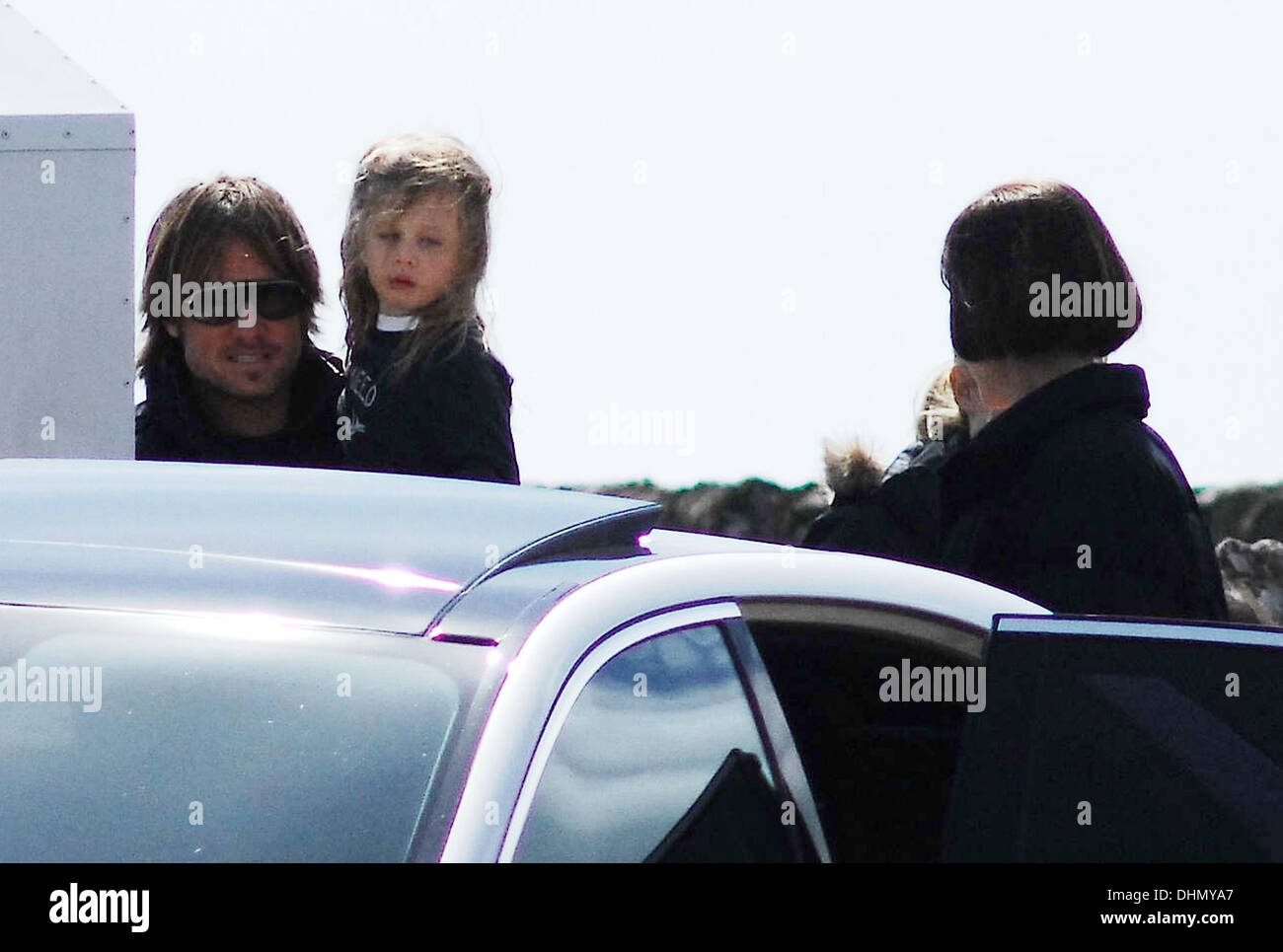 Nicole Kidman with her husband Keith Urban and their daughter leaving