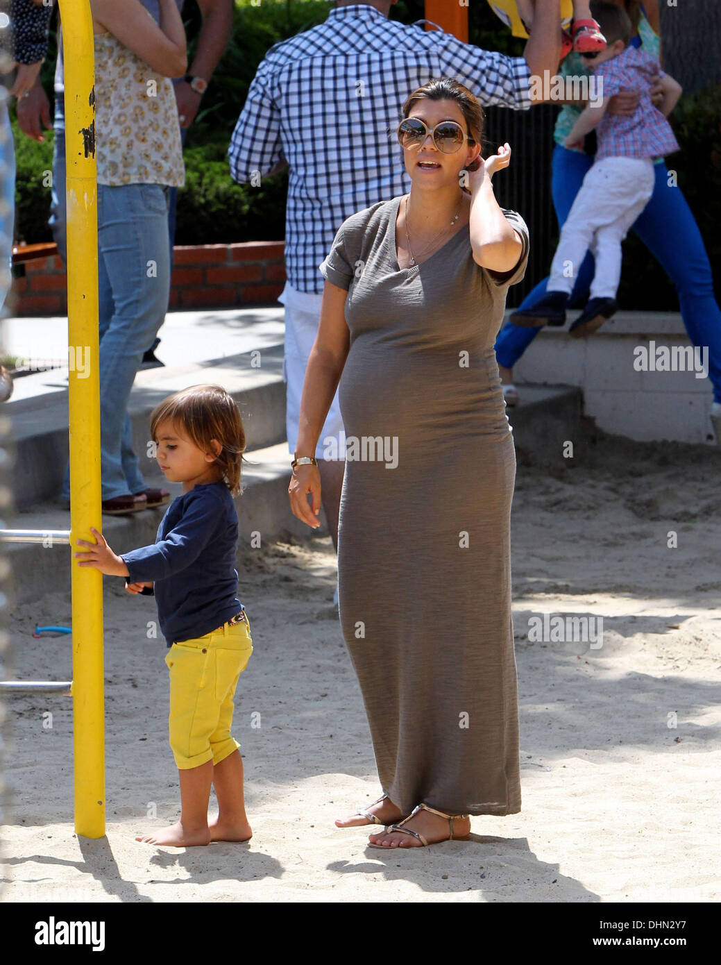 Heavily pregnant Kourtney Kardashian shows off her baby bump on a family  day out in Malibu with her son Mason Disick Malibu, California - 06.05.12  Stock Photo - Alamy, image size:1039x1390