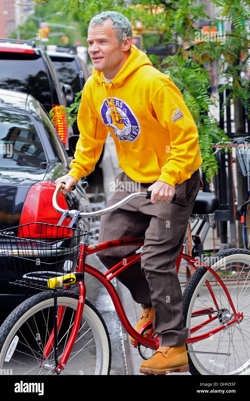 Flea aka Michael Balzary riding his bicycle in Manhattan New York City, USA  - 07.05.12 Stock Photo - Alamy