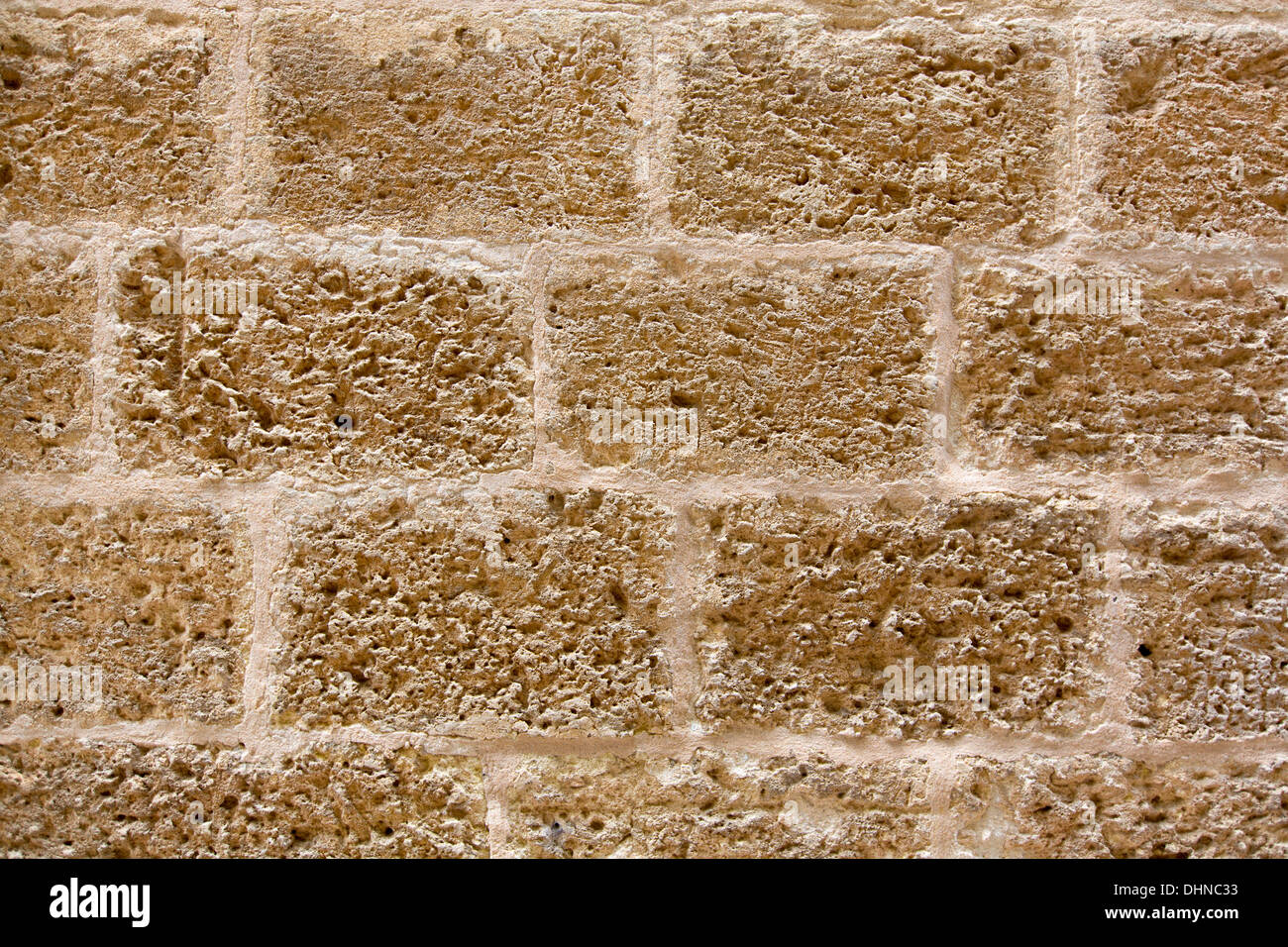 Menorca castle stonewall ashlar masonry wall texture antique in Balearic islands Stock Photo