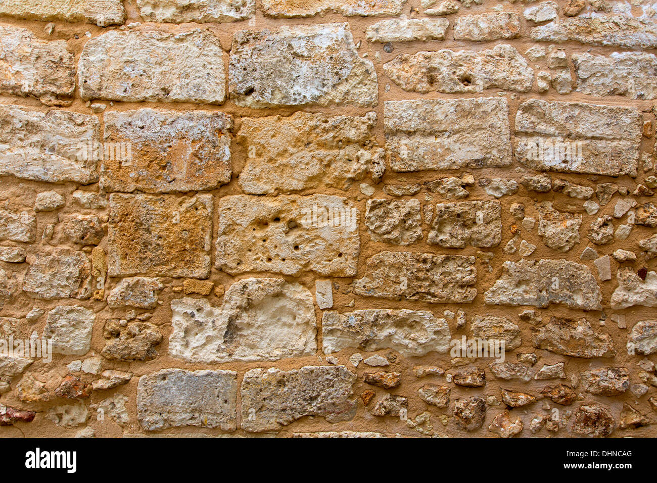 Menorca castle stonewall ashlar masonry wall texture antique in Balearic islands Stock Photo