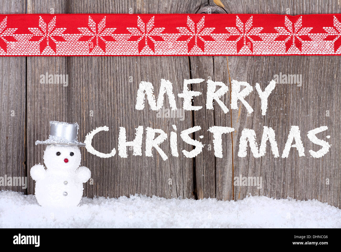 Christmas Greeting Card with a small Snowman and Snow Script on old ...