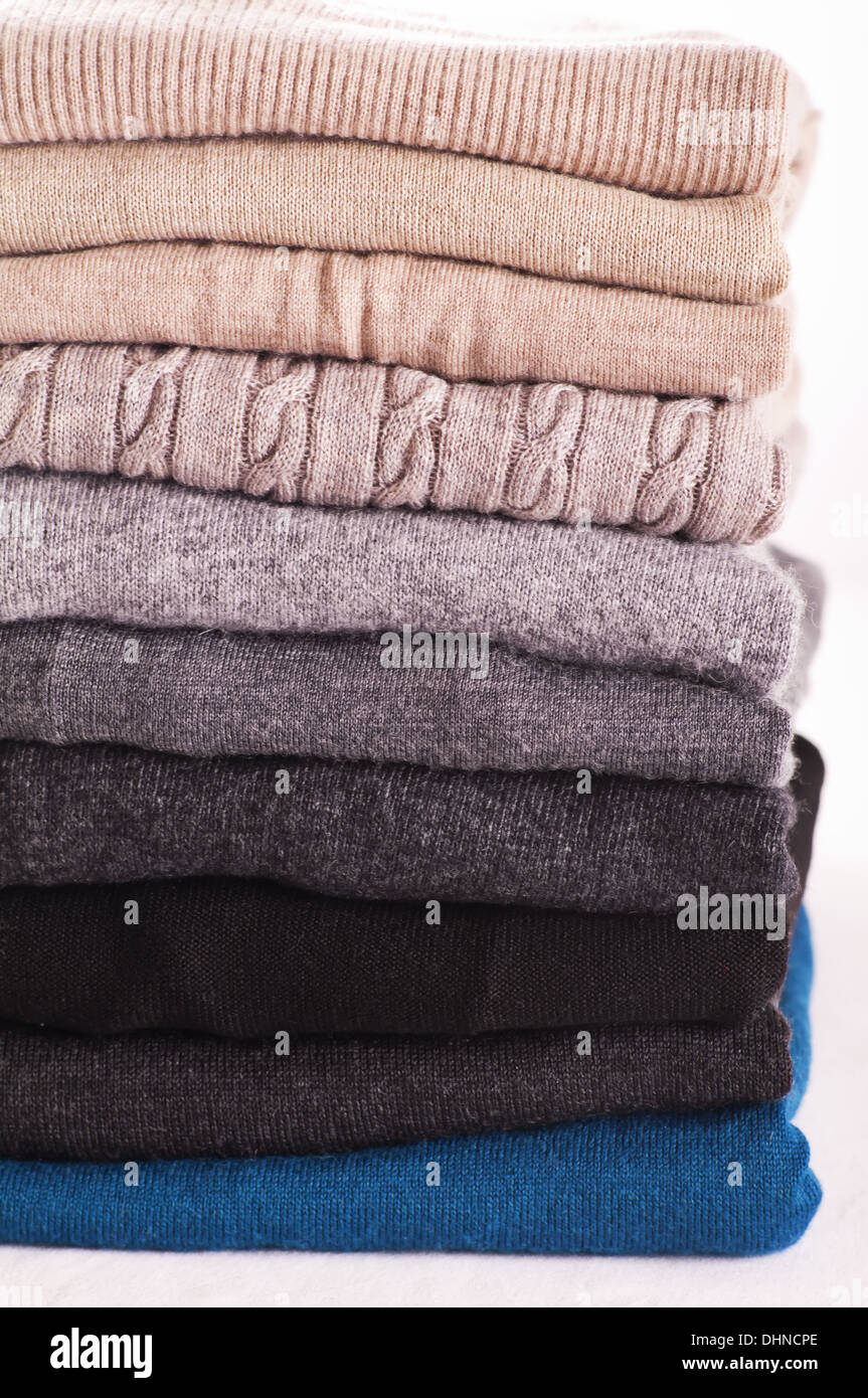wool sweaters on white background Stock Photo