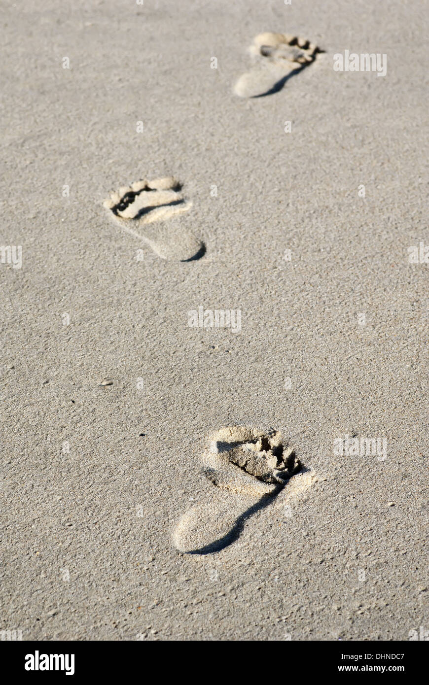 Footprints at the wet Sand Stock Photo