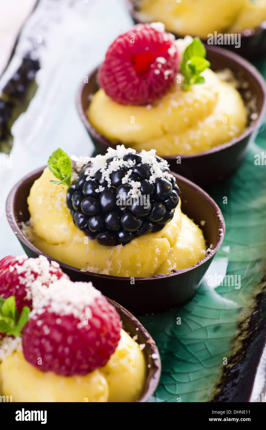 pralines with custard and berry filling Stock Photo