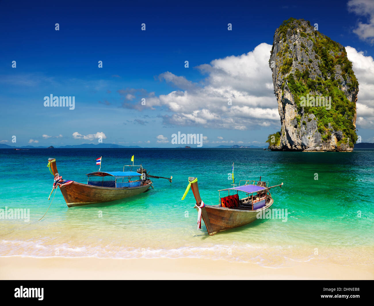 Long tail boats, Tropical beach, Andaman Sea, Thailand Stock Photo