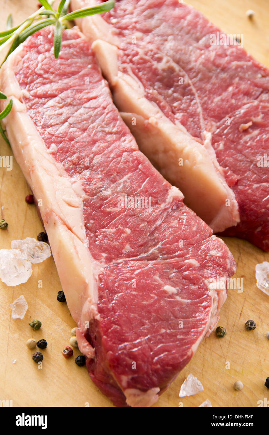 beef steaks with salt and pepper Stock Photo Alamy