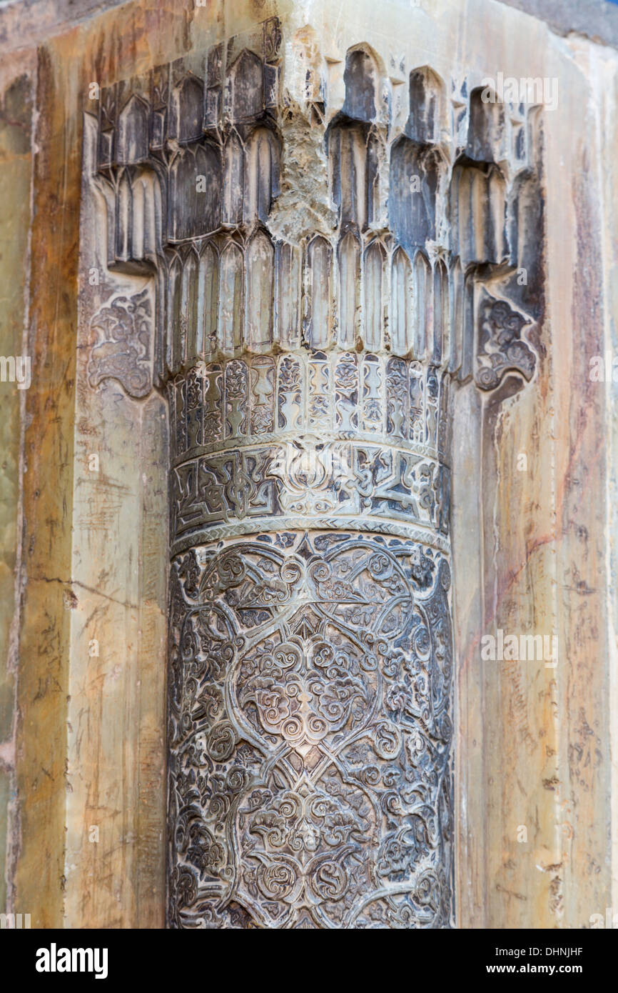 detail of carved marble engaged column, qibla iwan, Isfahan Friday mosque, Iran Stock Photo